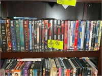 SHELF WITH VCR AND DVDS MISC TITLES AND AUTHORS