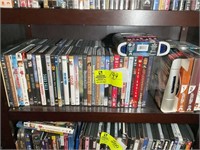 SHELF WITH VCR AND DVDS MISC TITLES AND AUTHORS