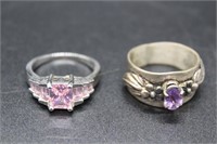 Three sterling rings: 14gtw - dolphin, floral & pk