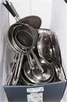 large quantity of pots and pans