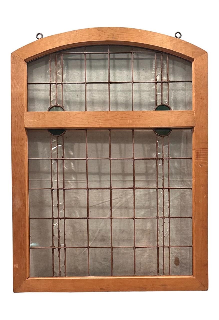 Framed Arched Copper Bound Glass Window
