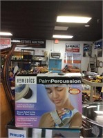 Palm percussion massager