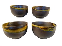 Set of (4) Stoneware bowls. 5 1/2in diameter