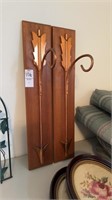 Pair of copper arrow wall hangings