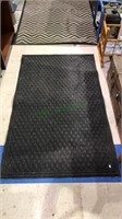 Commercial entrance mat, 60 x 36, has a rubber
