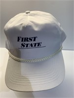 First state south, adjusting ball cap appears to
