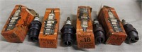 (4) NOS "Defiance" spark plugs in OB, all boxes