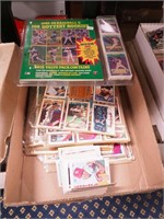 Box of 1988 Topps baseball cards in sleeves and