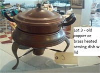 Old copper heated serving dish with lid