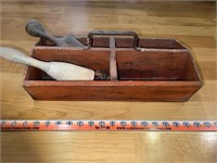 Red decorative wooden toolbox with metal handle