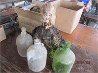 (3) GLASS JUGS & VINTAGE DOLL ON STAND