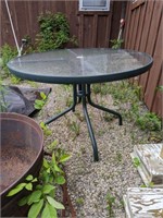 Glass topped patio table