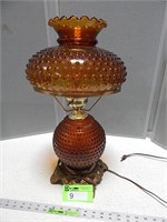 Vintage amber glass lamp; no chimney; upper metal