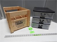 Wood wine bottle crate and a plastic organizer cab