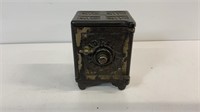 Vintage cast iron ideal safe deposit coin bank.