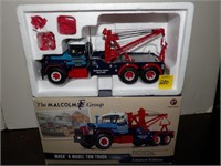 Malcolm Group Tow truck First Gear