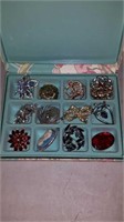 FLORAL JEWELLERY BOX FULL OF BROACHES