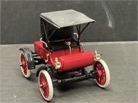 1904 Oldsmobile Curved Dash. Die cast and