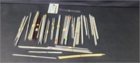 Large assortment of knitting needles with