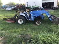 New Holland tractor runs and drives with shedder