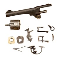 Mostly Webley revolver components.