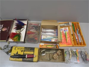 Vintage fishing lures and a Pflueger Supreme