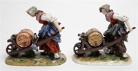 2 Dresden Woman Pushing Wheelbarrow Figurines.