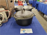 TWO CAST IRON DUTCH OVENS