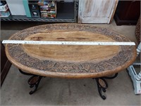 Iron base wood top coffee table