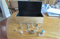 15 costume jewellery rings in jewellery box