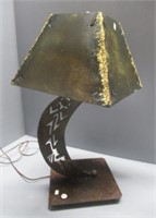Metal lamp with tin shade. Measures: 24.25" Tall.