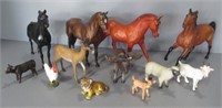 Breyer horses and other animal figures.
