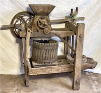 Antique fruit press with fruit crusher and bottom