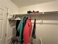 Clothes, shoes, hangers in closet