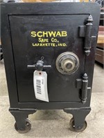 OLD COMBINATION SAFE ON ROLLERS W/ COMBINATION