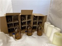 3 Boxes Amber Bottles 6 ea & Box of Candles