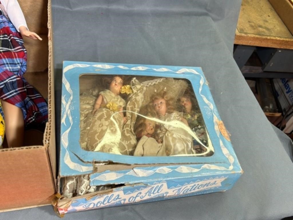 Two boxes of dolls