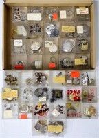 Watch Parts Organized in Small Boxes