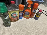 CLEANING PRODUCTS AND BUCKET MOST OVER HALF FULL