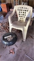 Plastic chair and Weber grill