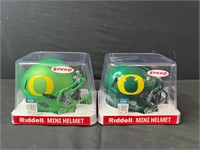 Two U of O Mini Helmets