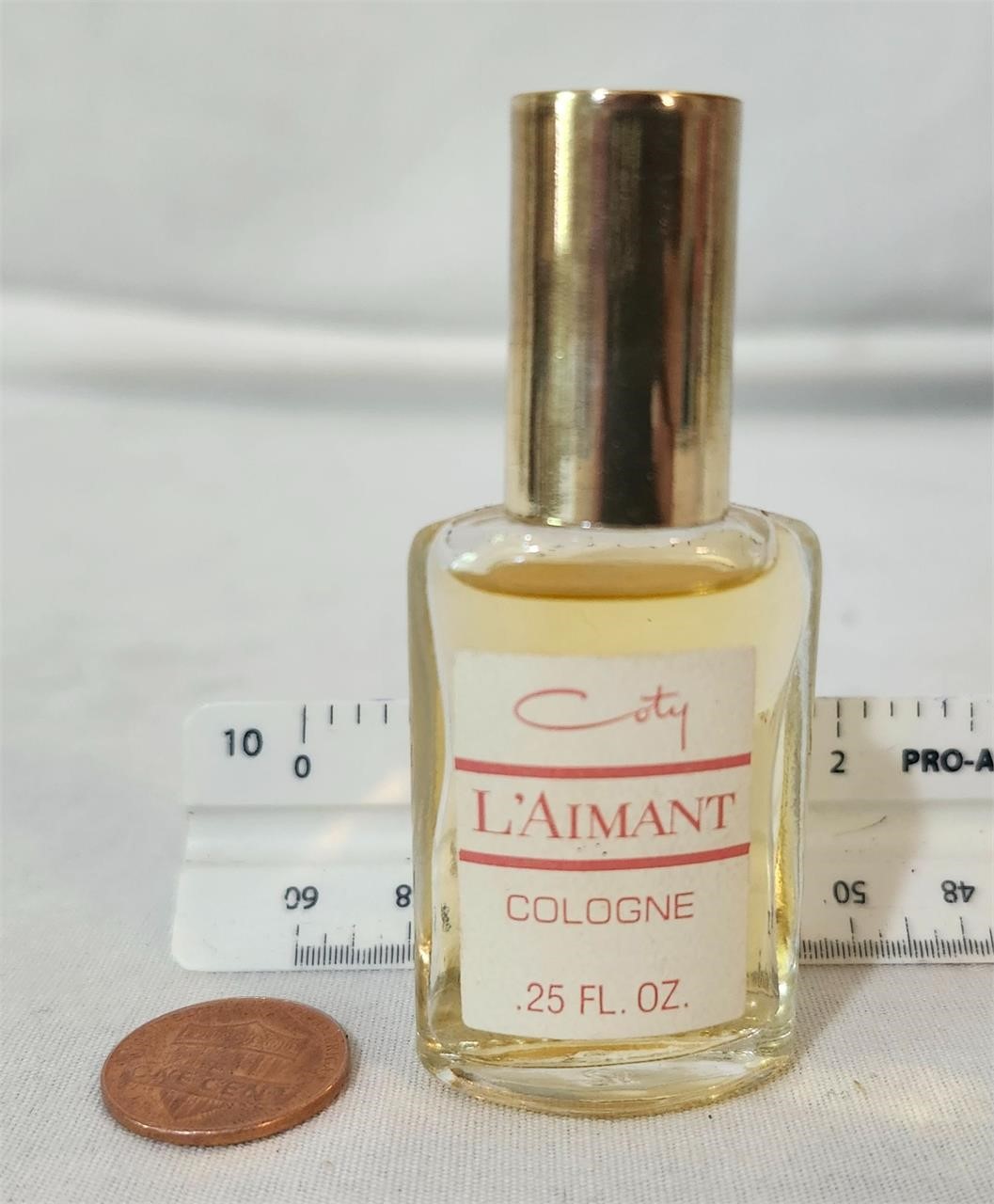 Vintage Coty L'Aimant cologne .25 oz full