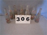 .  Lot of 7 vintage Pepsi Cola bottles