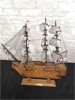 " HMS Victory " replica wooden ship with stand.