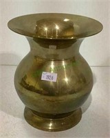 Brass vase measuring 6 inches tall.