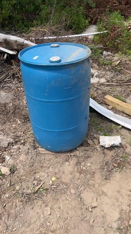 Plastic 50 gallon barrel and assorted wood