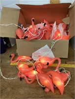 Box of plastic flamingo lights