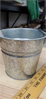 Small bucket with jewelry