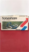 Outdoor Horseshoes game- 4 cast iron horseshoes