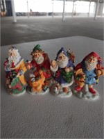 4 Santa figurines